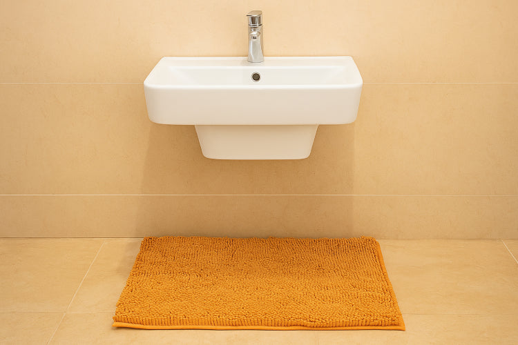 Tapis de bain ocre lavabo