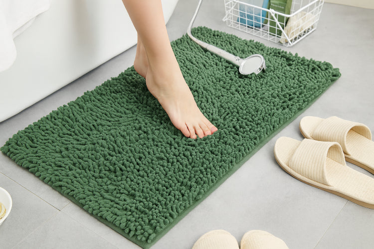 Tapis de bain vert sapin pieds
