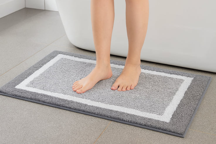 Long tapis de bain pieds 