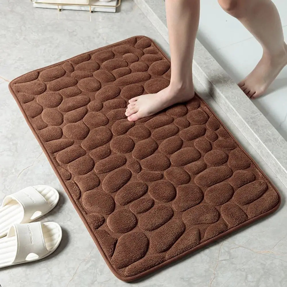 Tapis de bain antidérapant en relief avec pavés et absorbant l'eau marron