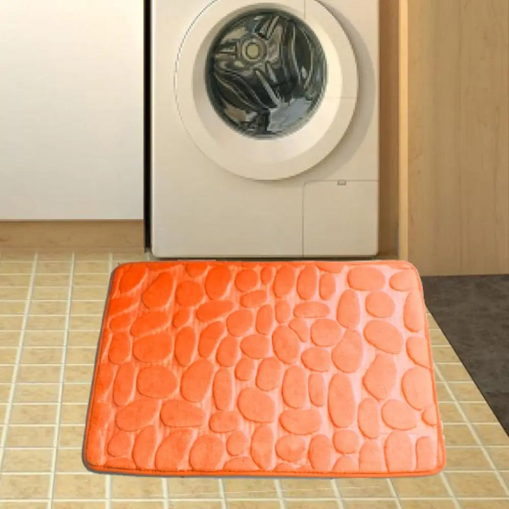 Tapis de bain antidérapant en relief avec pavés et absorbant l'eau orange