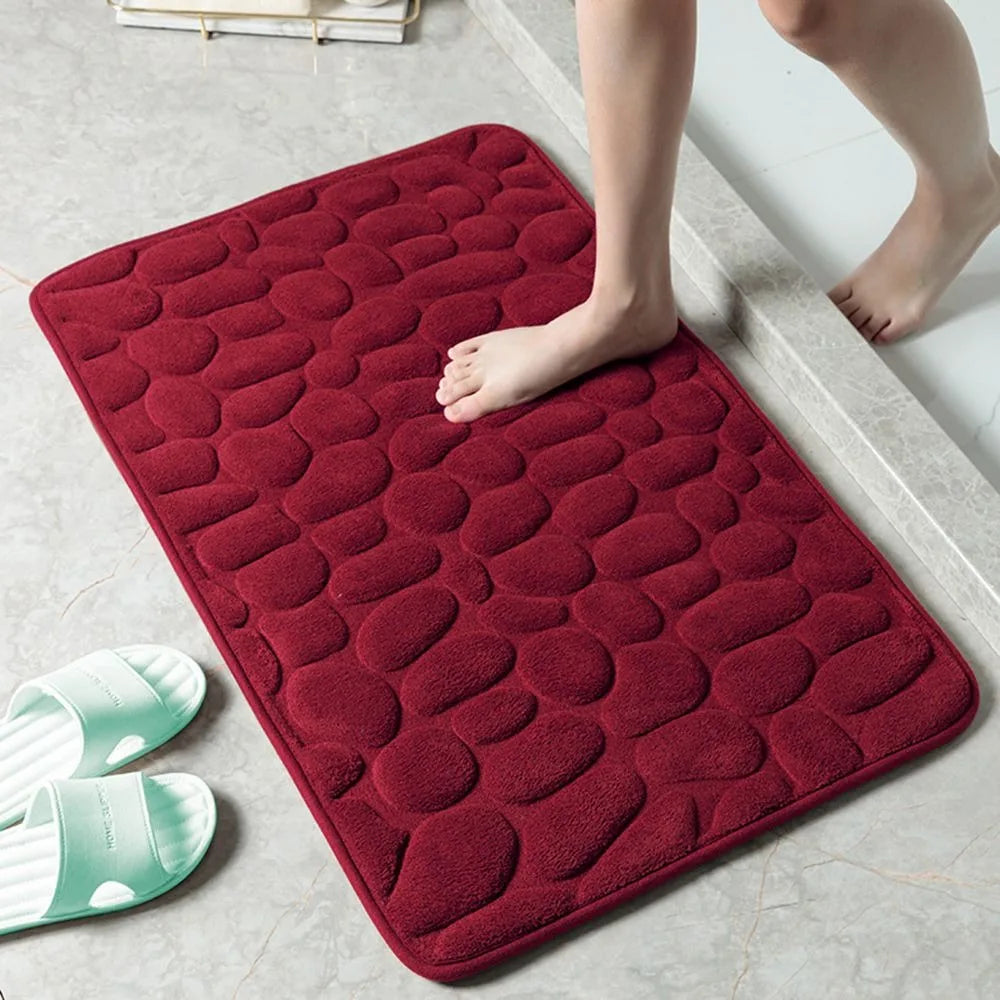 Tapis de bain antidérapant en relief avec pavés et absorbant l'eau rouge