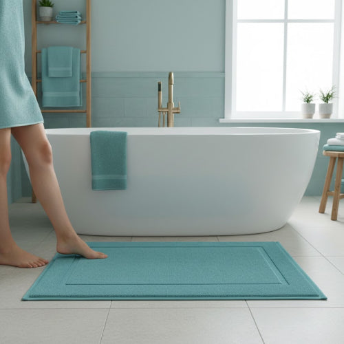 Tapis de bain bleu canard pieds 