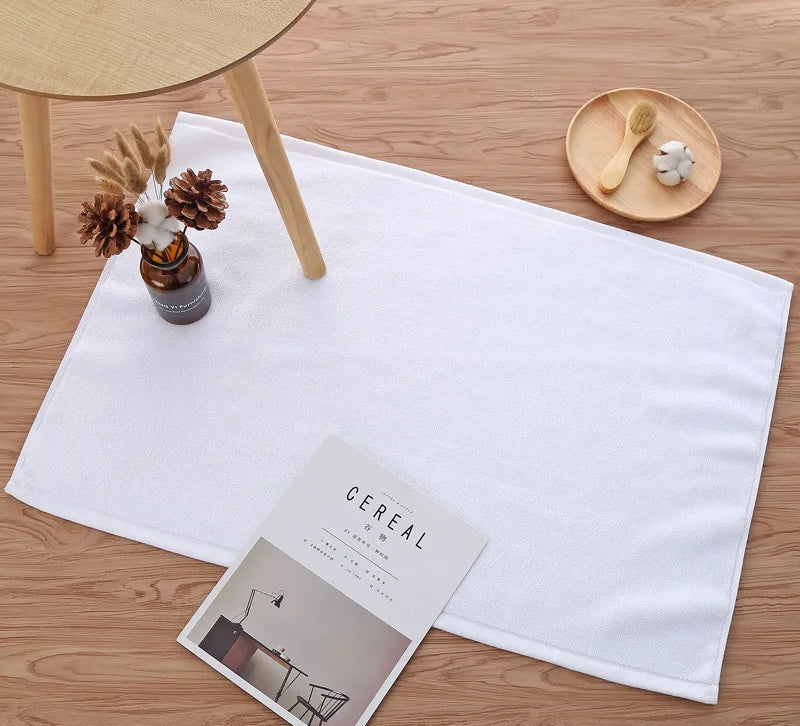 Tapis de bain coton table