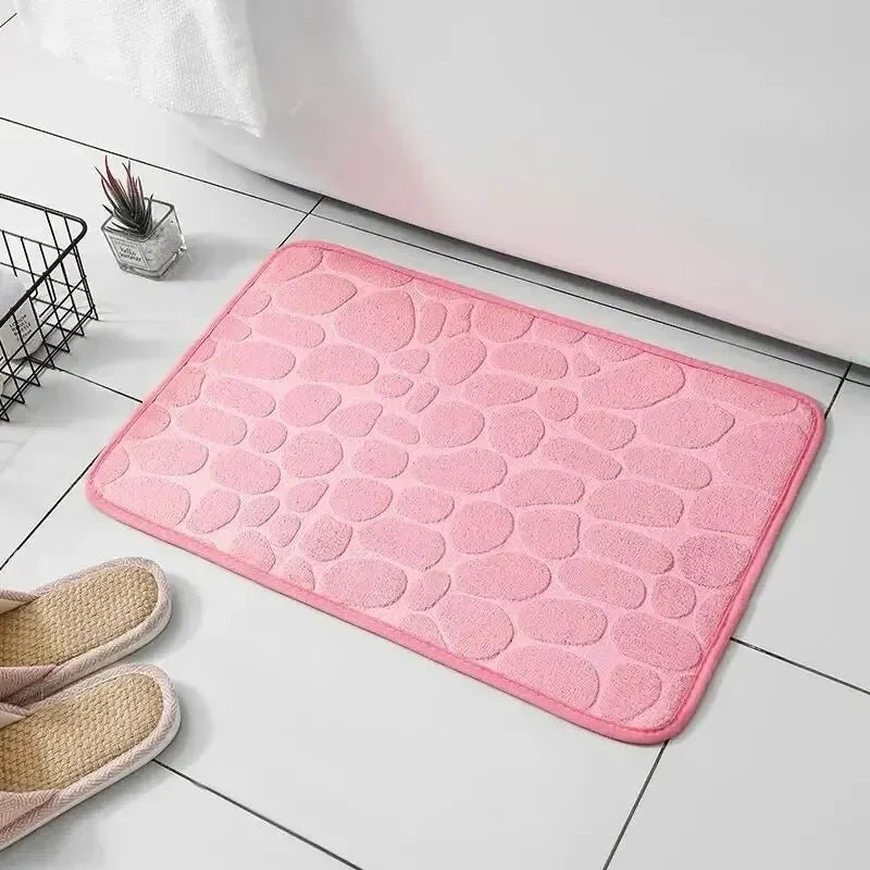 Tapis de bain mémoire de forme galet rose