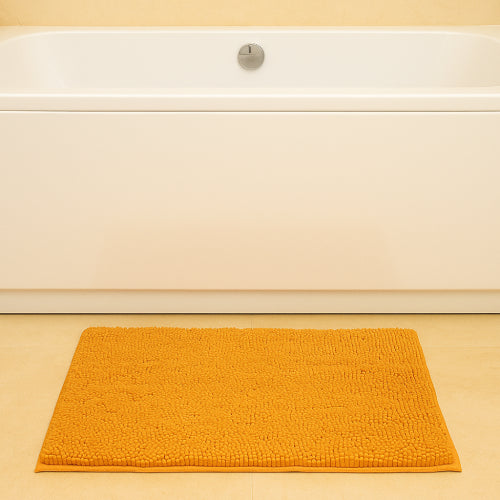 Tapis de bain ocre baignoire 