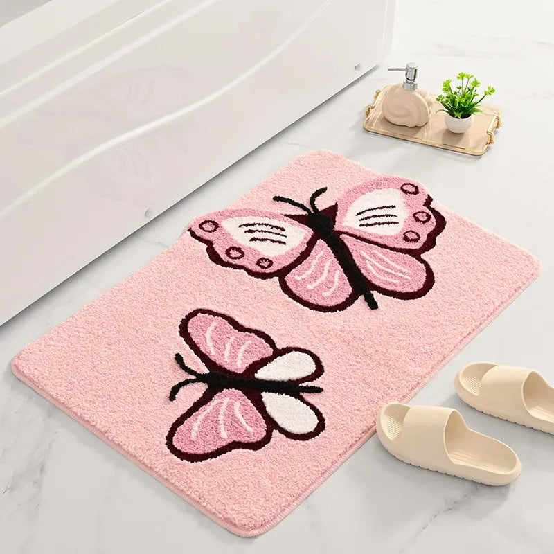 Tapis de bain papillon rose