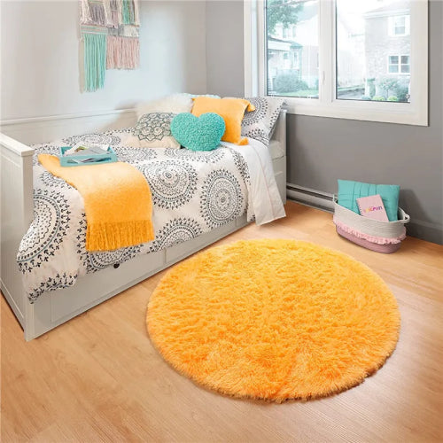 Tapis de bain rond orange  lit 