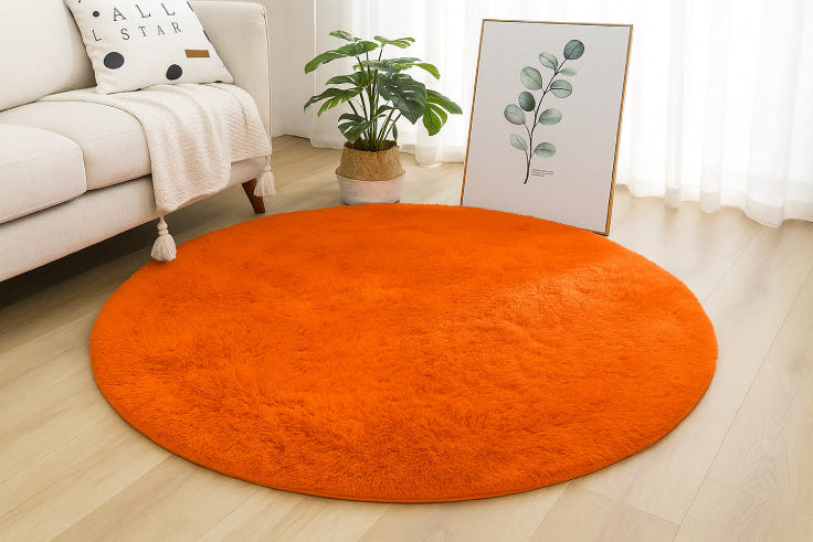 Tapis de bain rond orange salon 