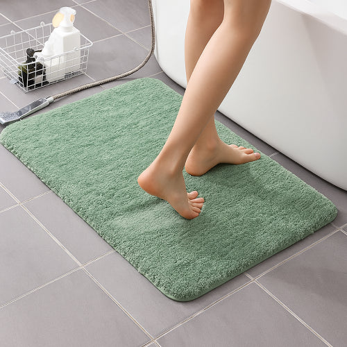 Tapis de bain vert amande  panier