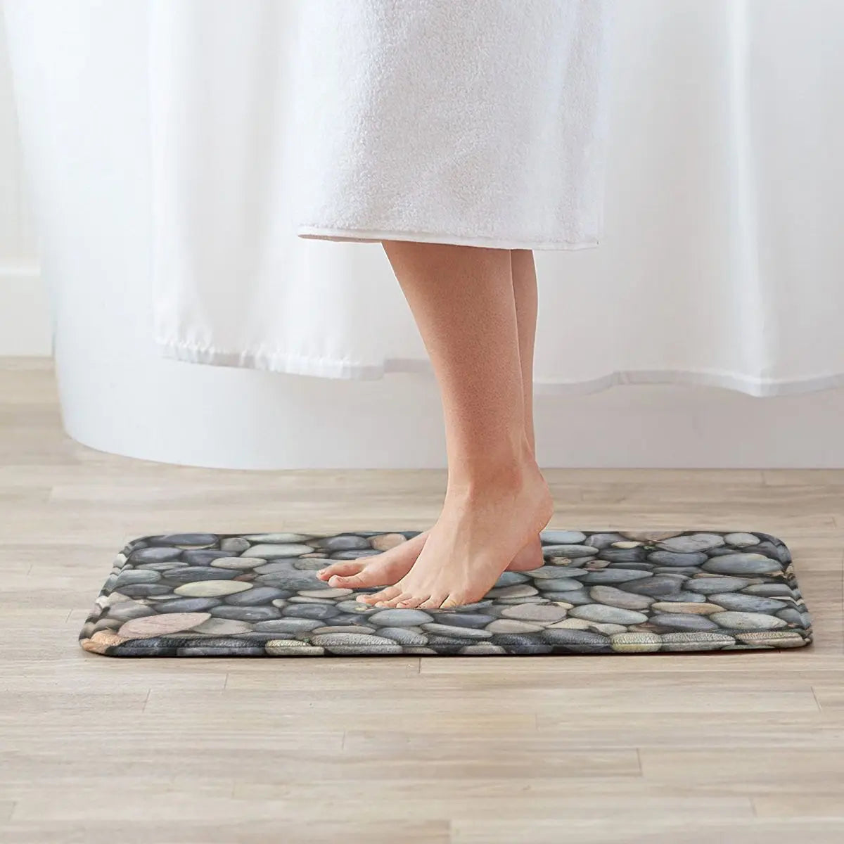 Tapis de pierre salle de bain pieds