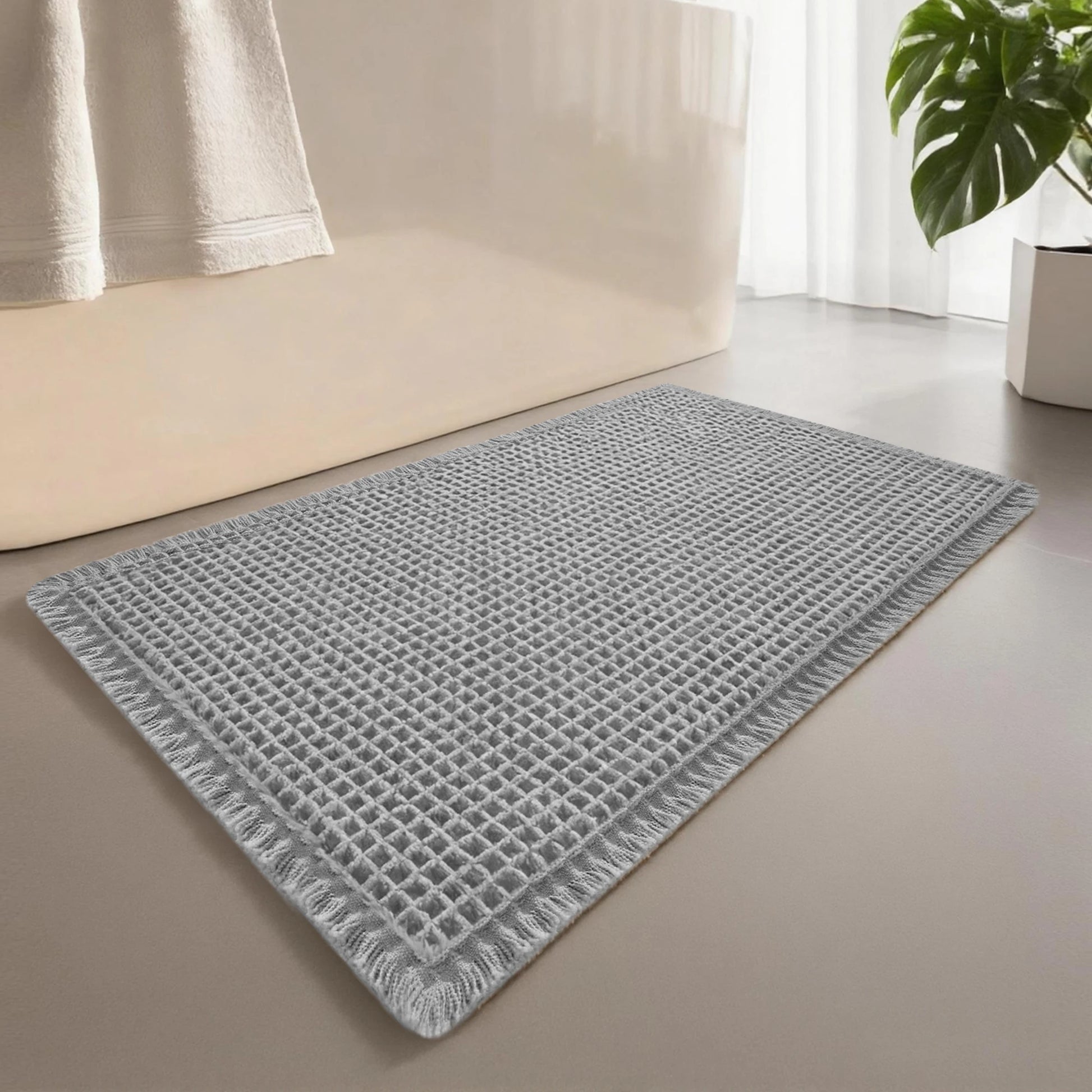 Tapis de salle de bain gaufré gris 