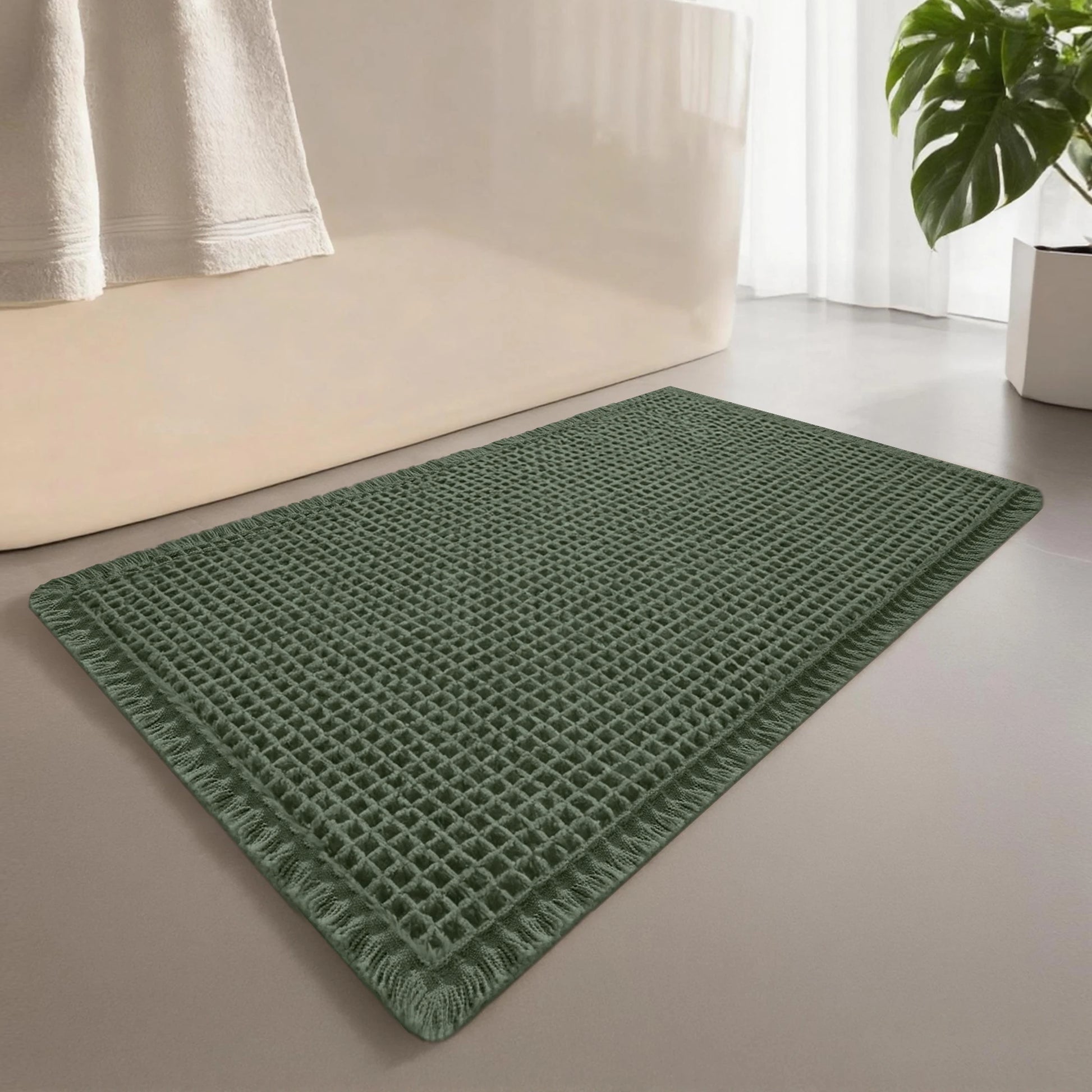 Tapis de salle de bain gaufré vert