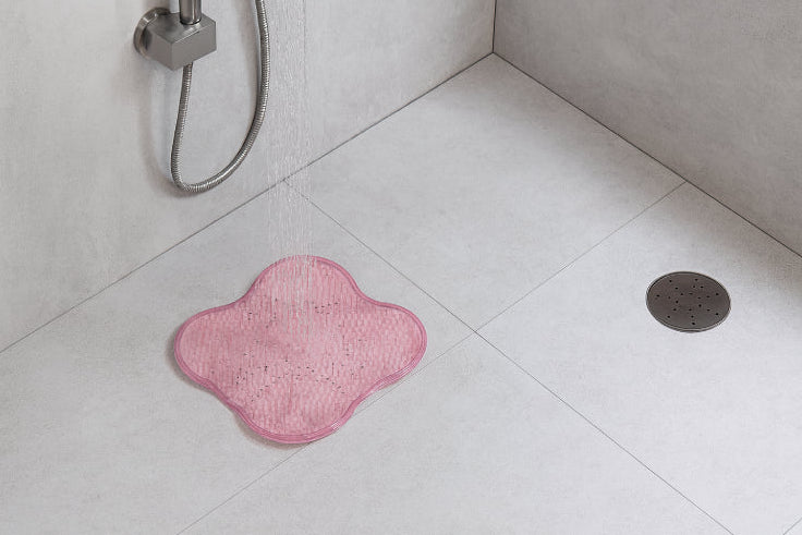 Tapis magique salle de bain pieds rose