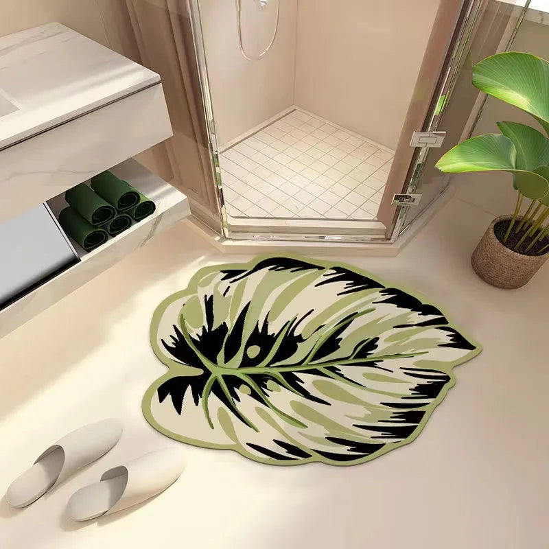 Tapis salle de bain forme originale feuille vert blanc noir
