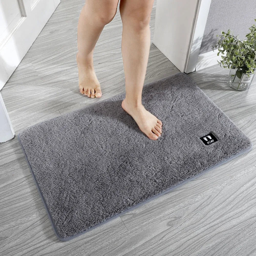 Tapis salle de bain original pieds