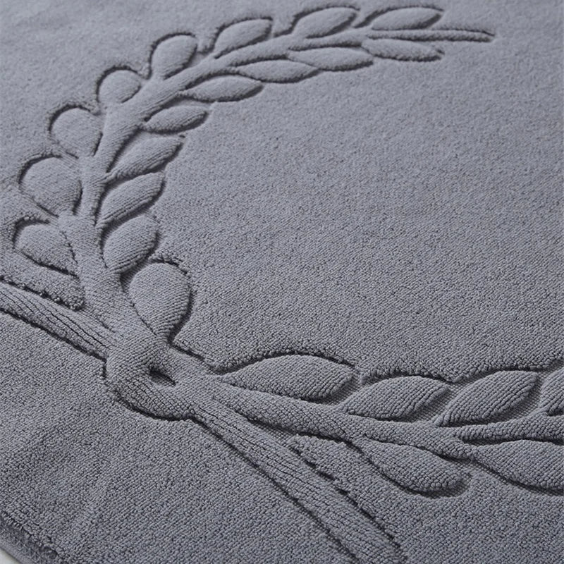 Tapis salle de bain style hôtel motif 